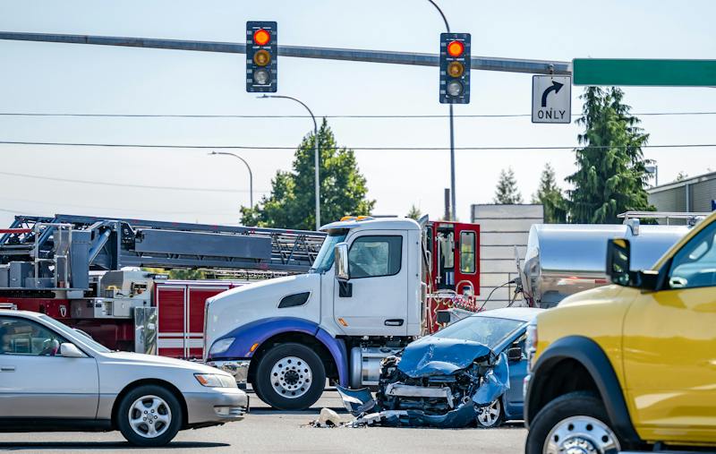 car smashed by a truck