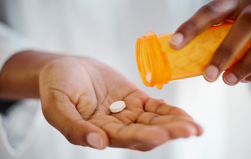 person taking a pill