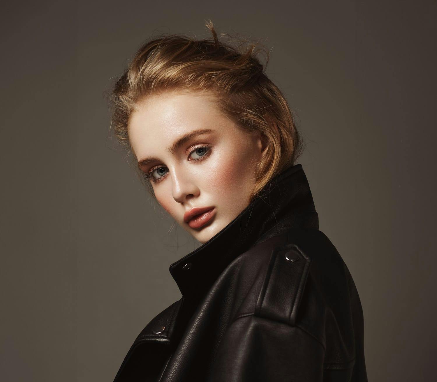 woman with blonde hair in a bun