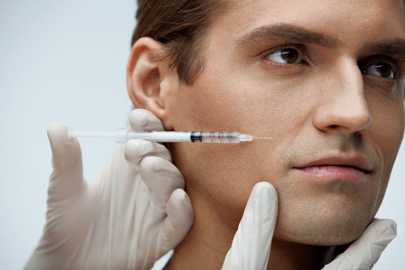 man receiving injectable treatment