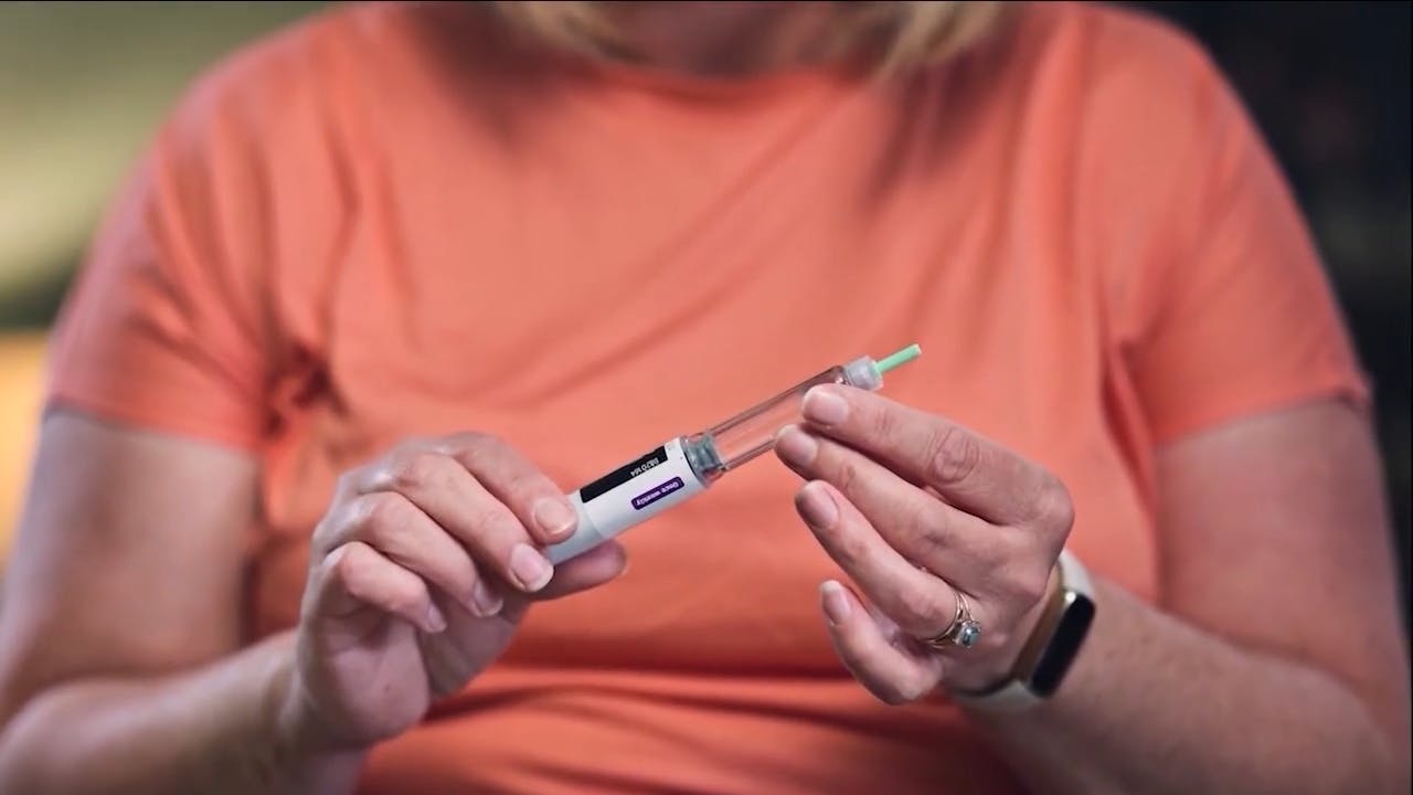 Person holding peptide