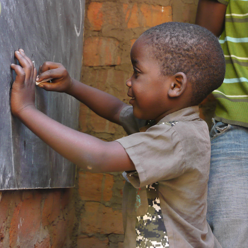 Child in classroom, Malawi