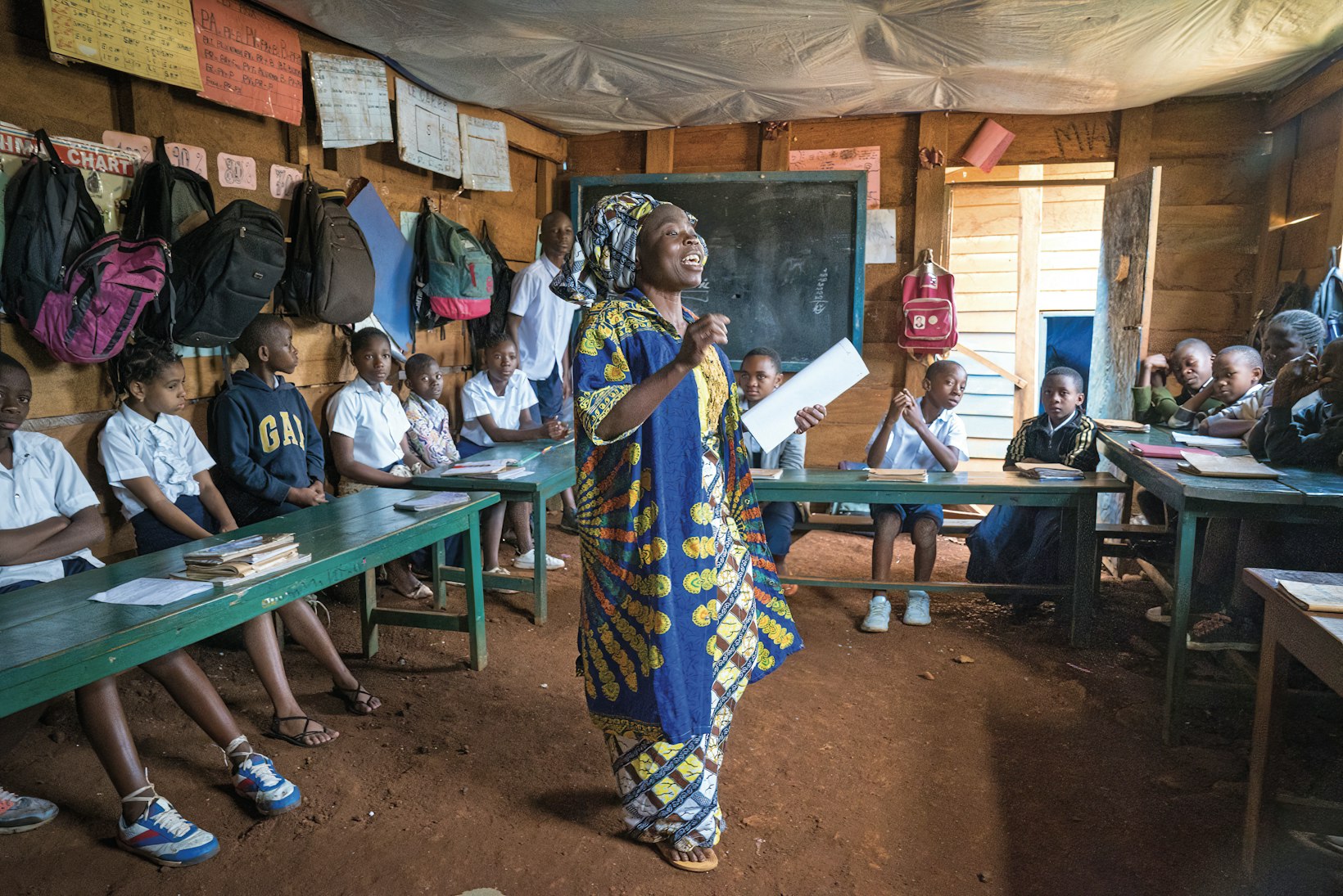 Teacher with students, Democratic Republic of the Congo