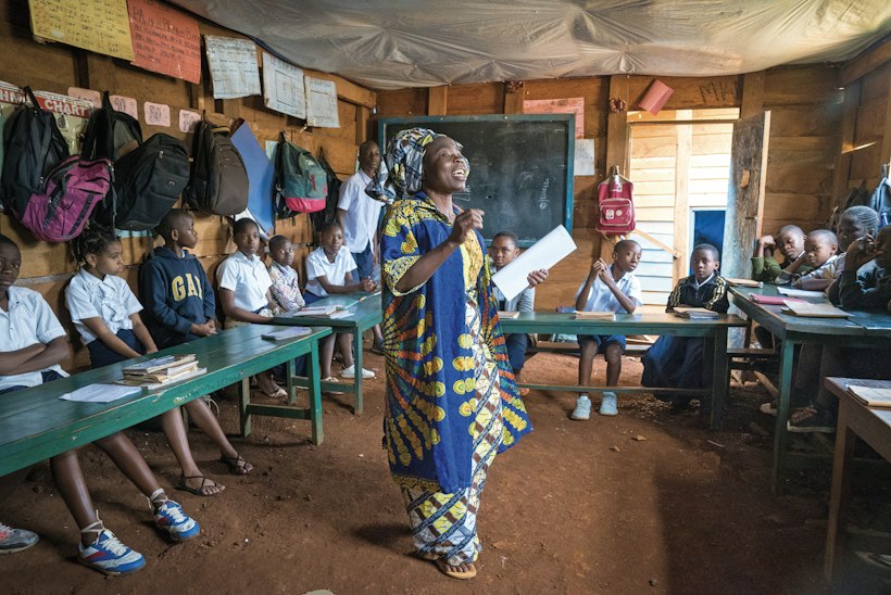 Teacher with students, Democratic Republic of the Congo