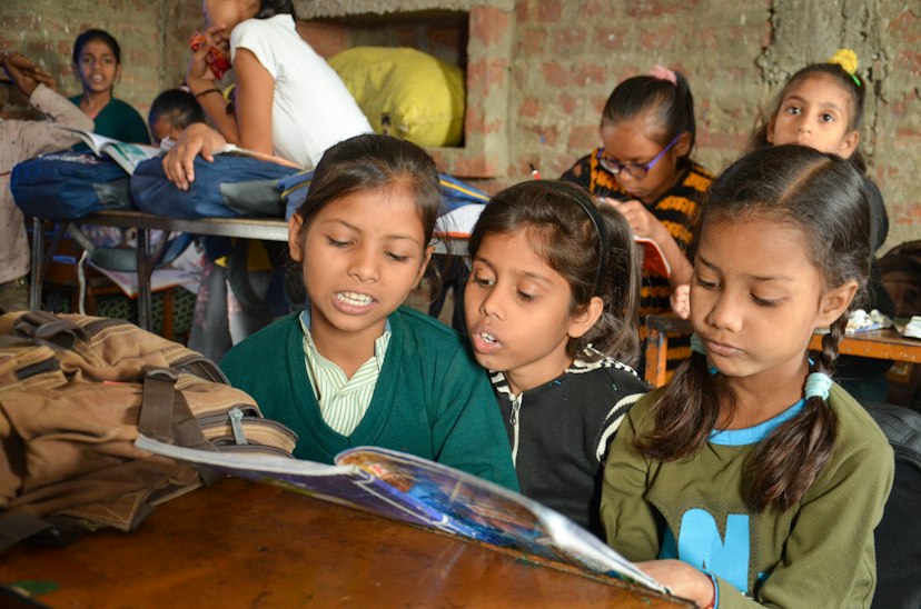 Young people studying, India