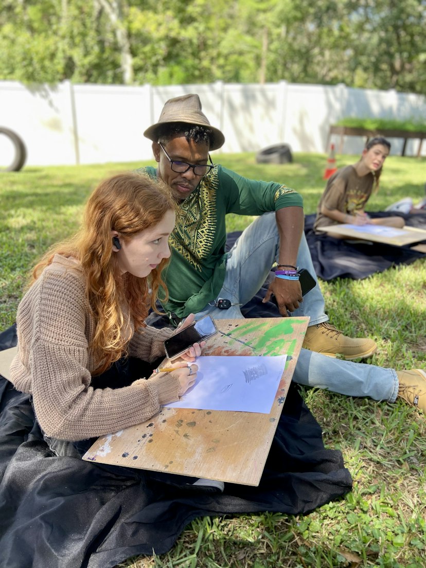 Students learning in park, United States