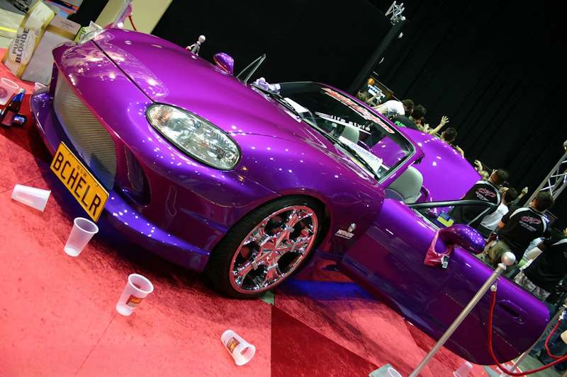 Purple Mazda MX5 with chrome wheels and BCHELR plate at show