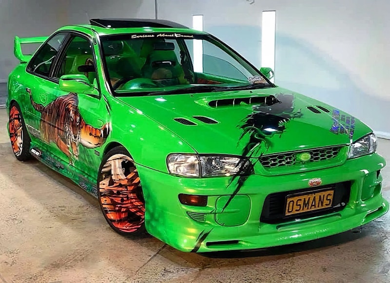 Jungle theme paint job with tiger-pattern wheels