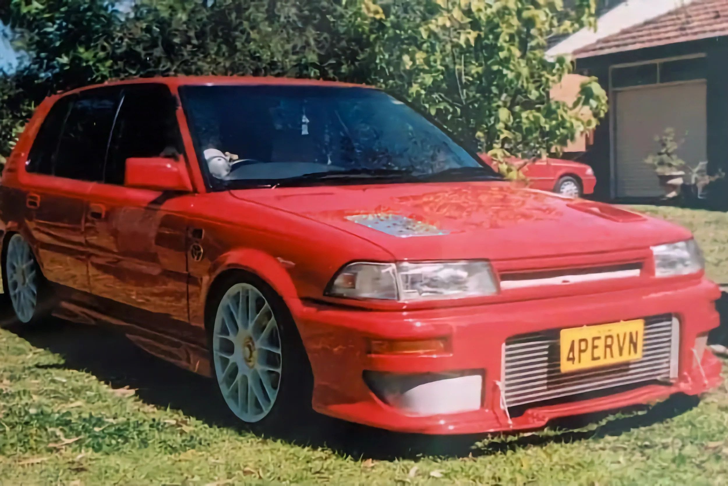 Red Corolla with large front mount intercooler