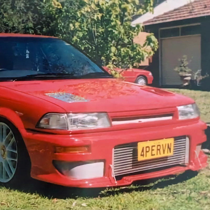 Red Corolla with large front mount intercooler