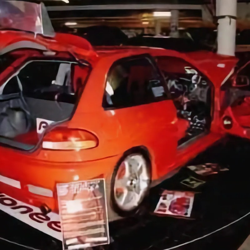 Red Satria with Pioneer boot install