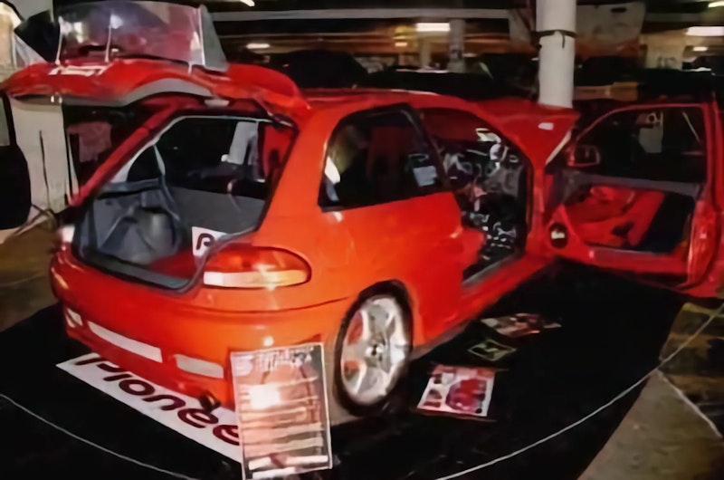 Red Satria with Pioneer boot install