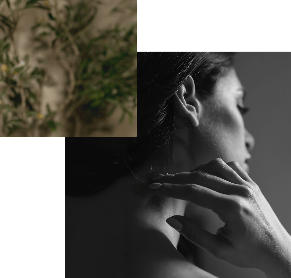 woman touching her neck