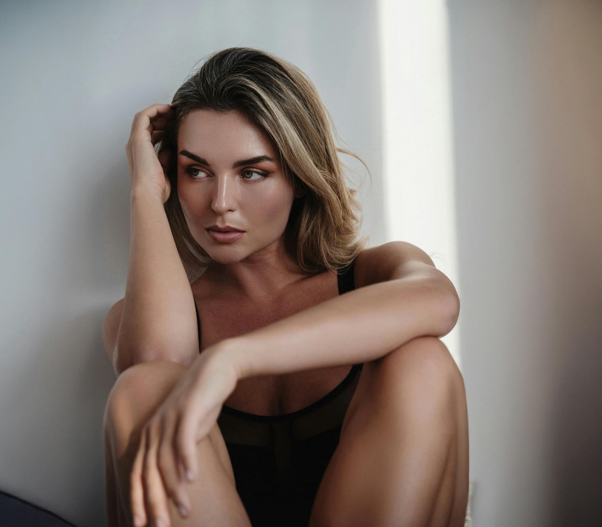 woman sitting on the ground