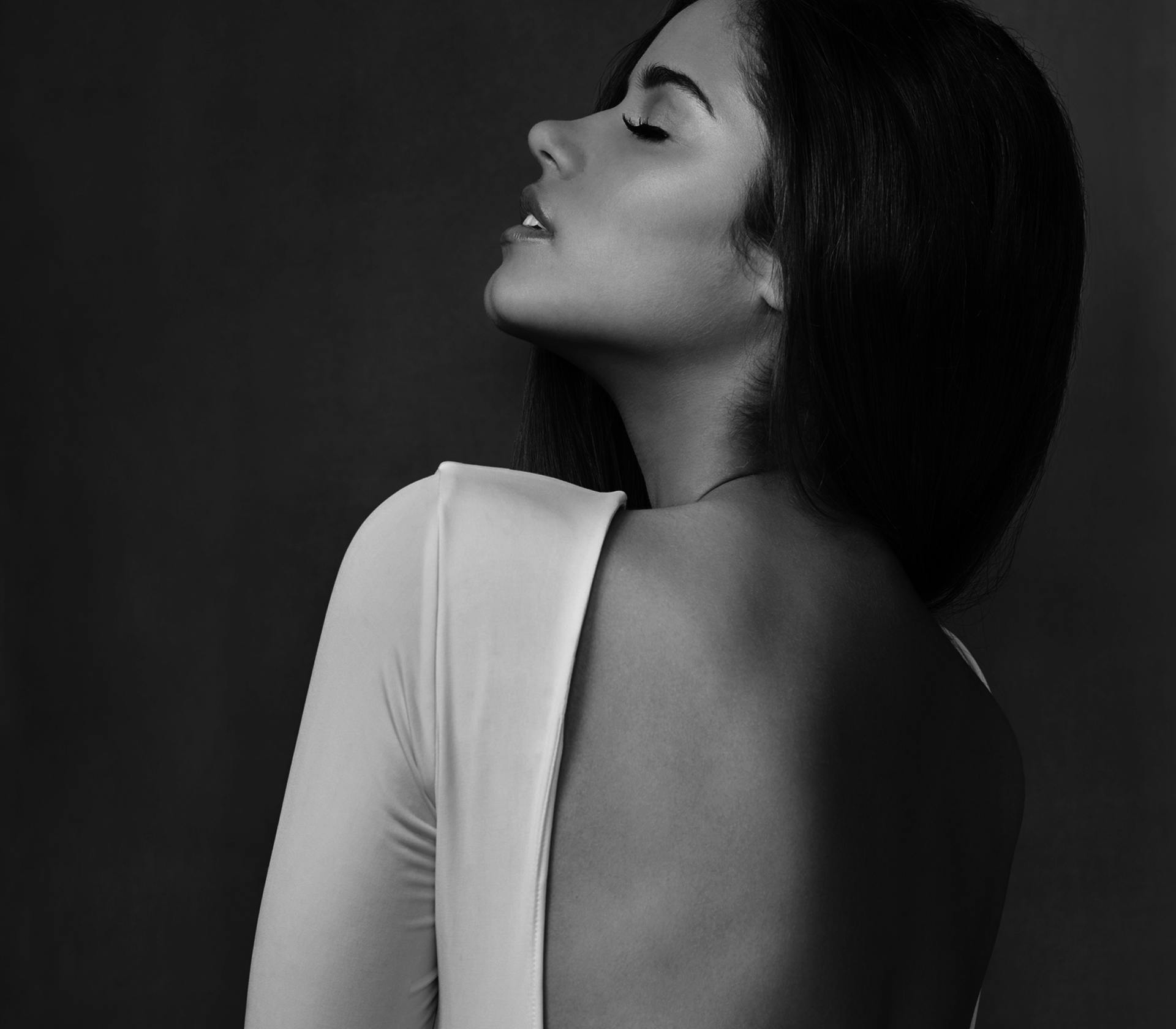 woman looking over their shoulder