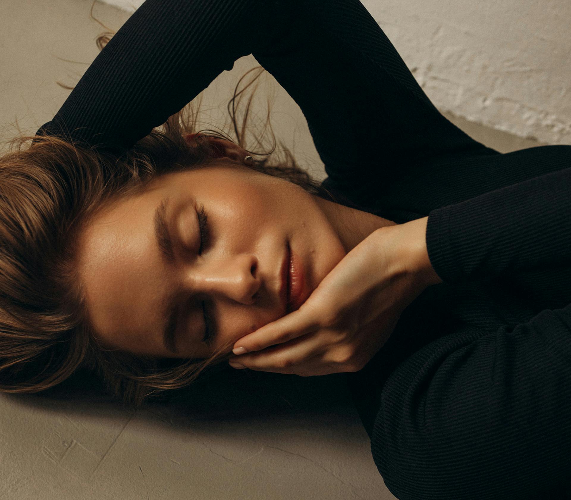 woman laying on the floor