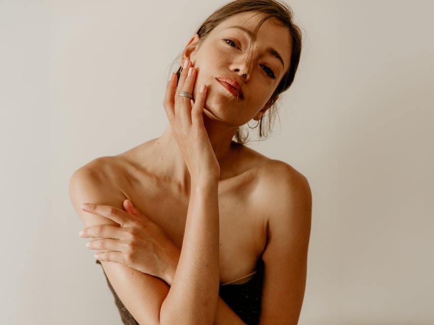 woman touching her jaw