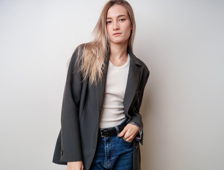 woman with hand in pocket