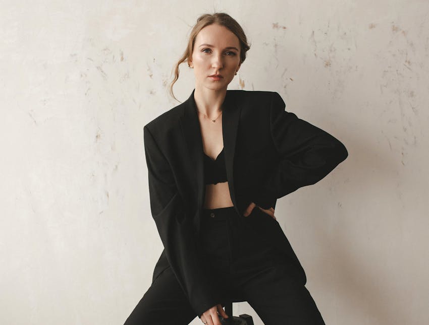 woman sitting on stool