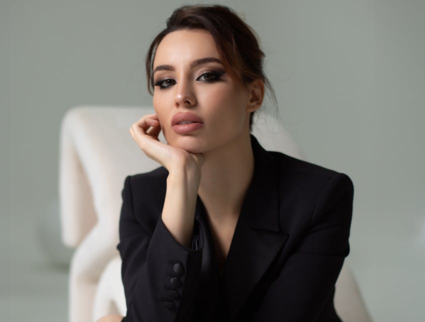 woman with head in hands