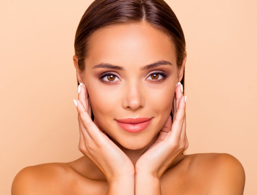 woman with head in hands