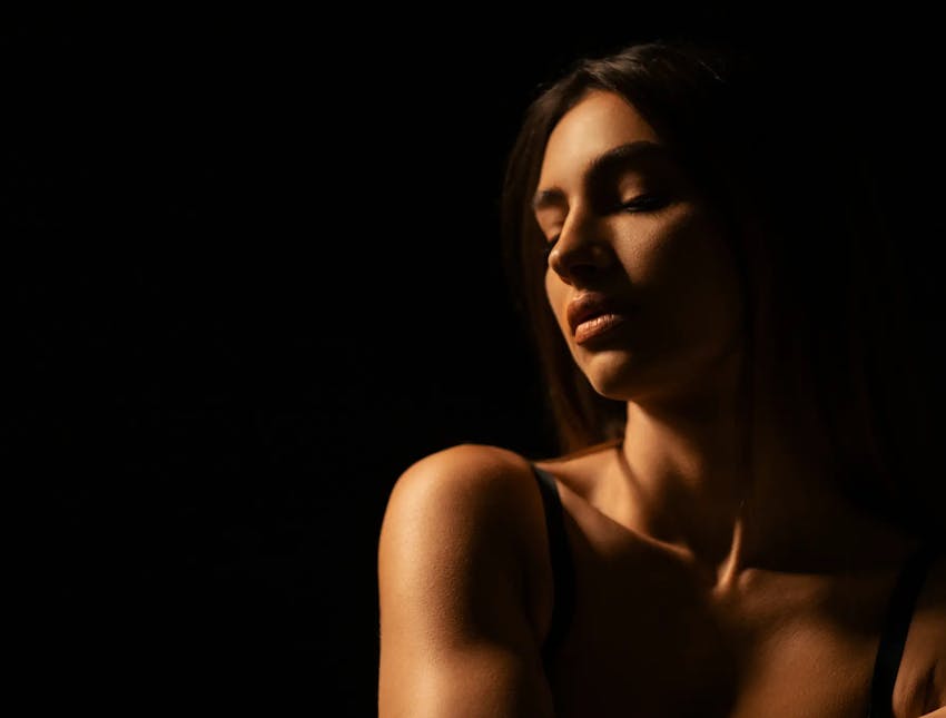 woman looking over shoulder