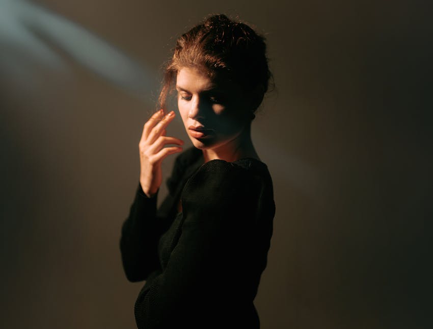 woman looking over shoulder