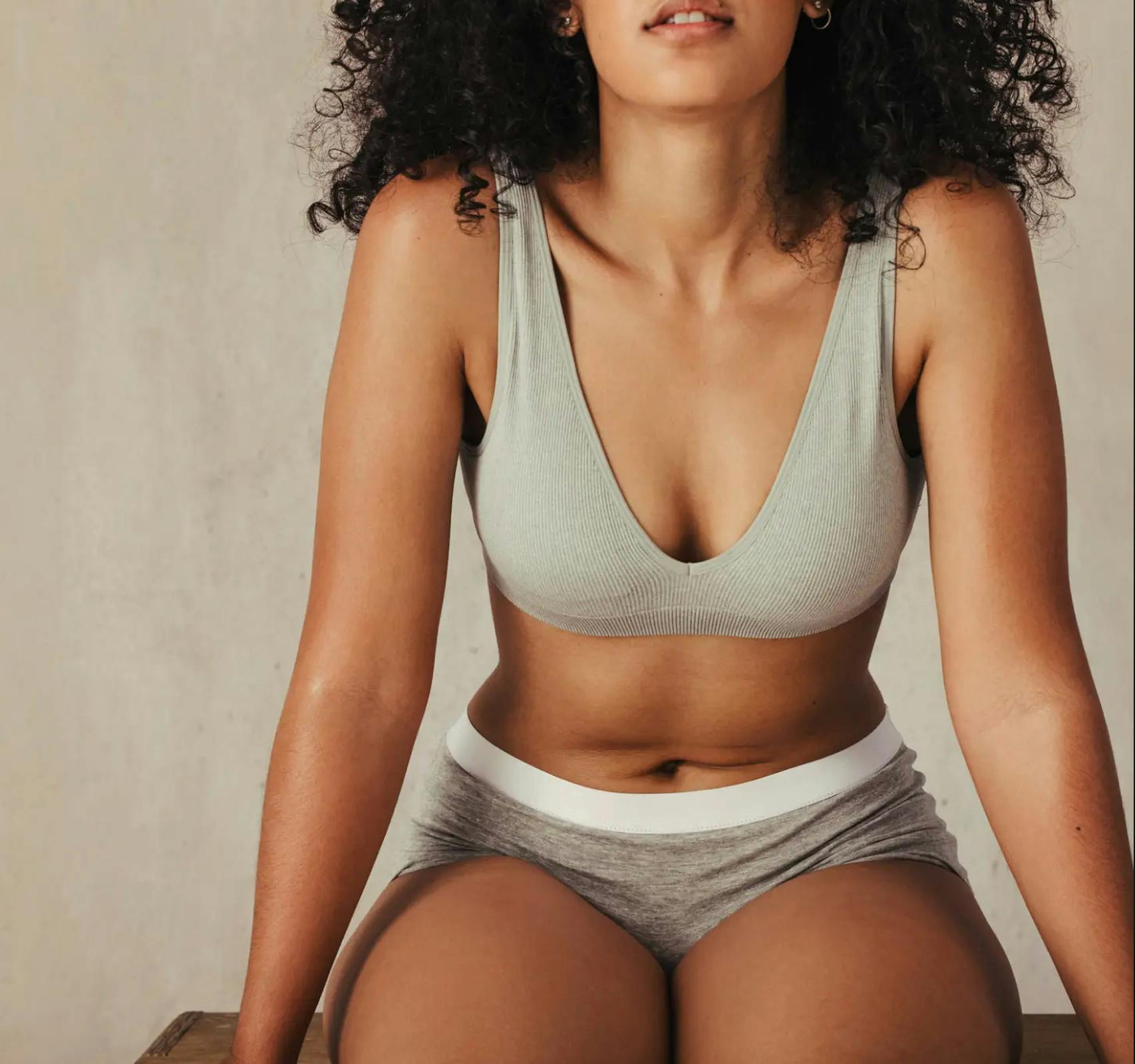 womans body in underwear