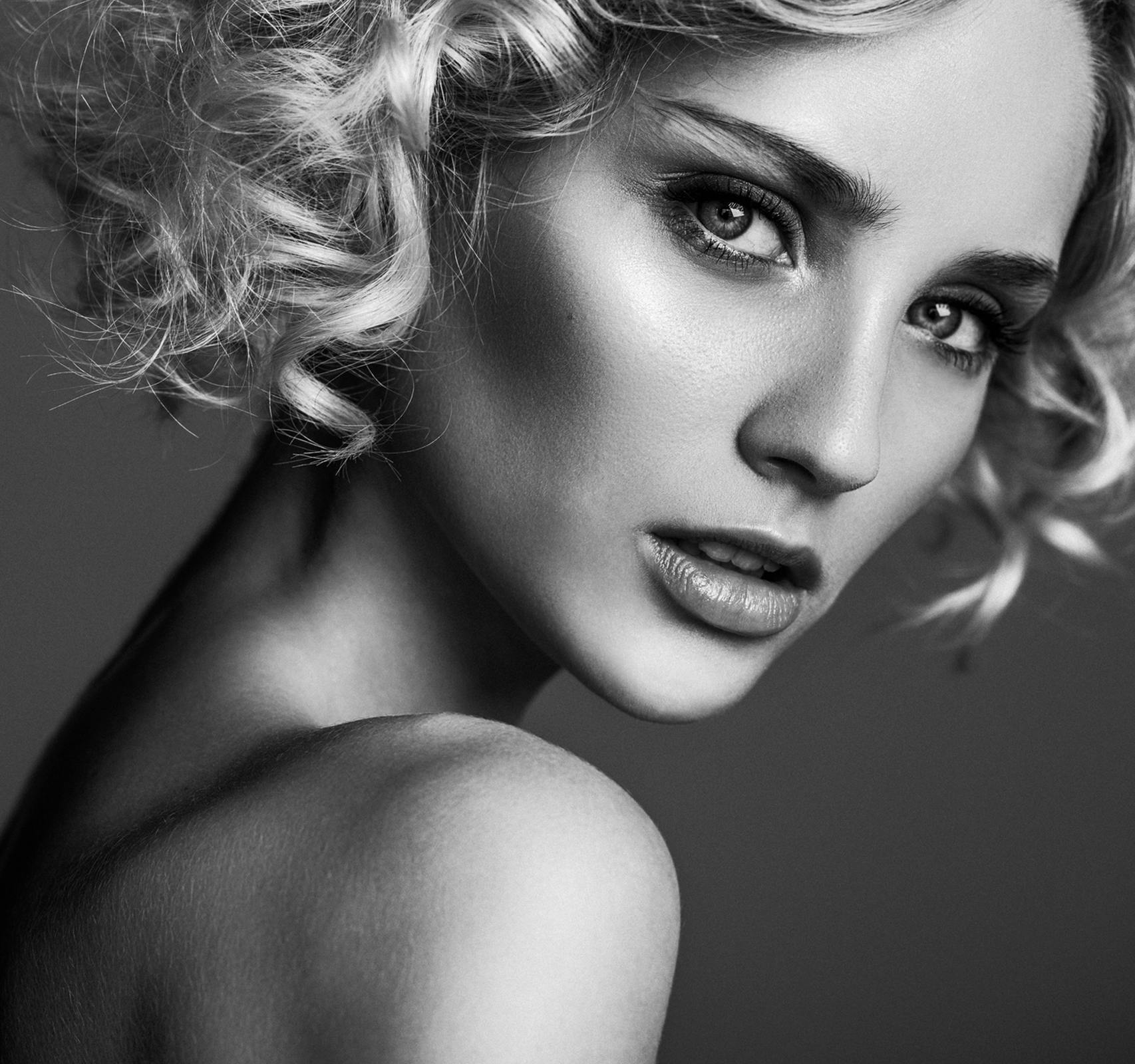 woman looking over shoulder