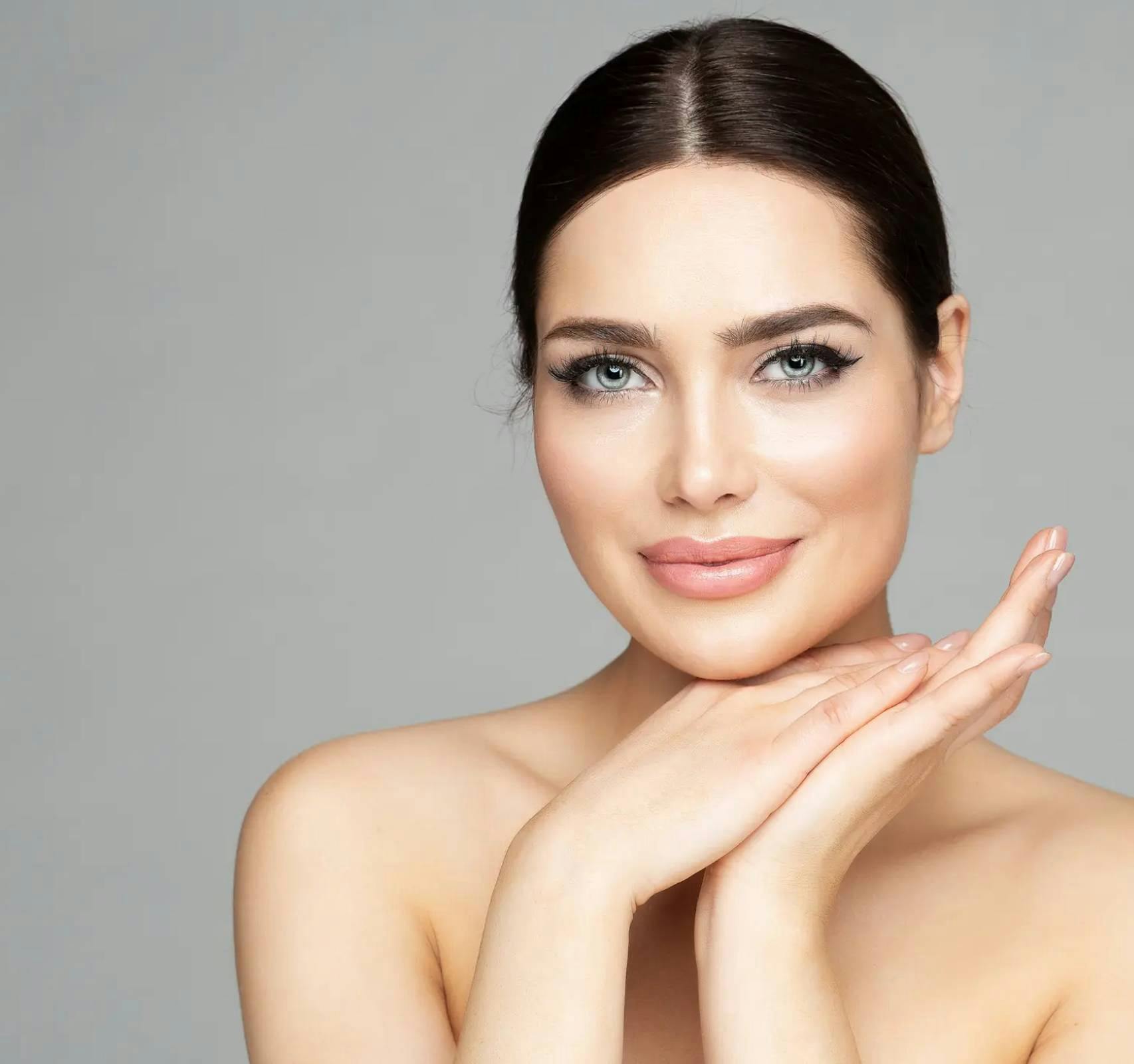 woman resting chin on hands