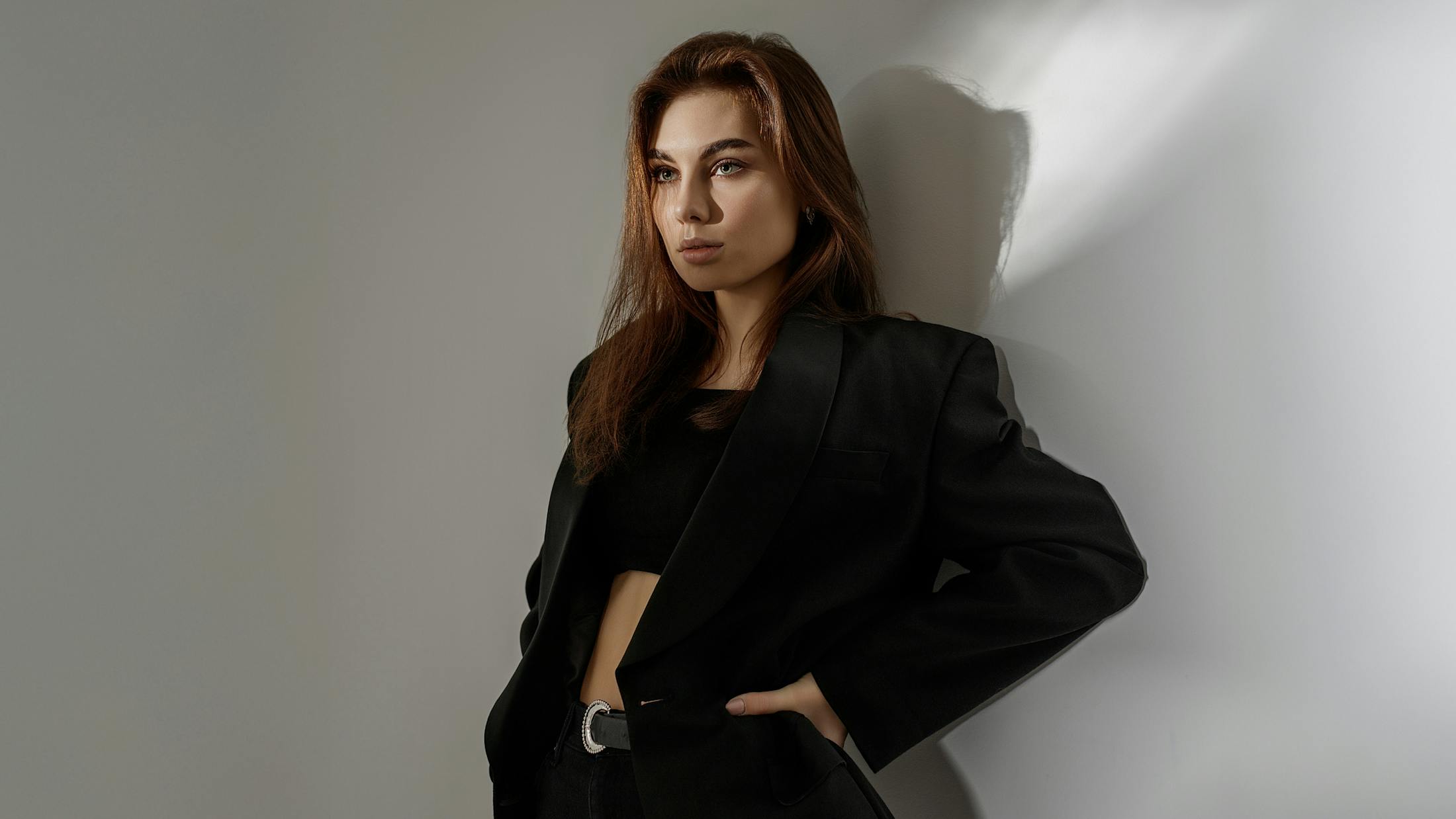 woman wearing a black suit jacket