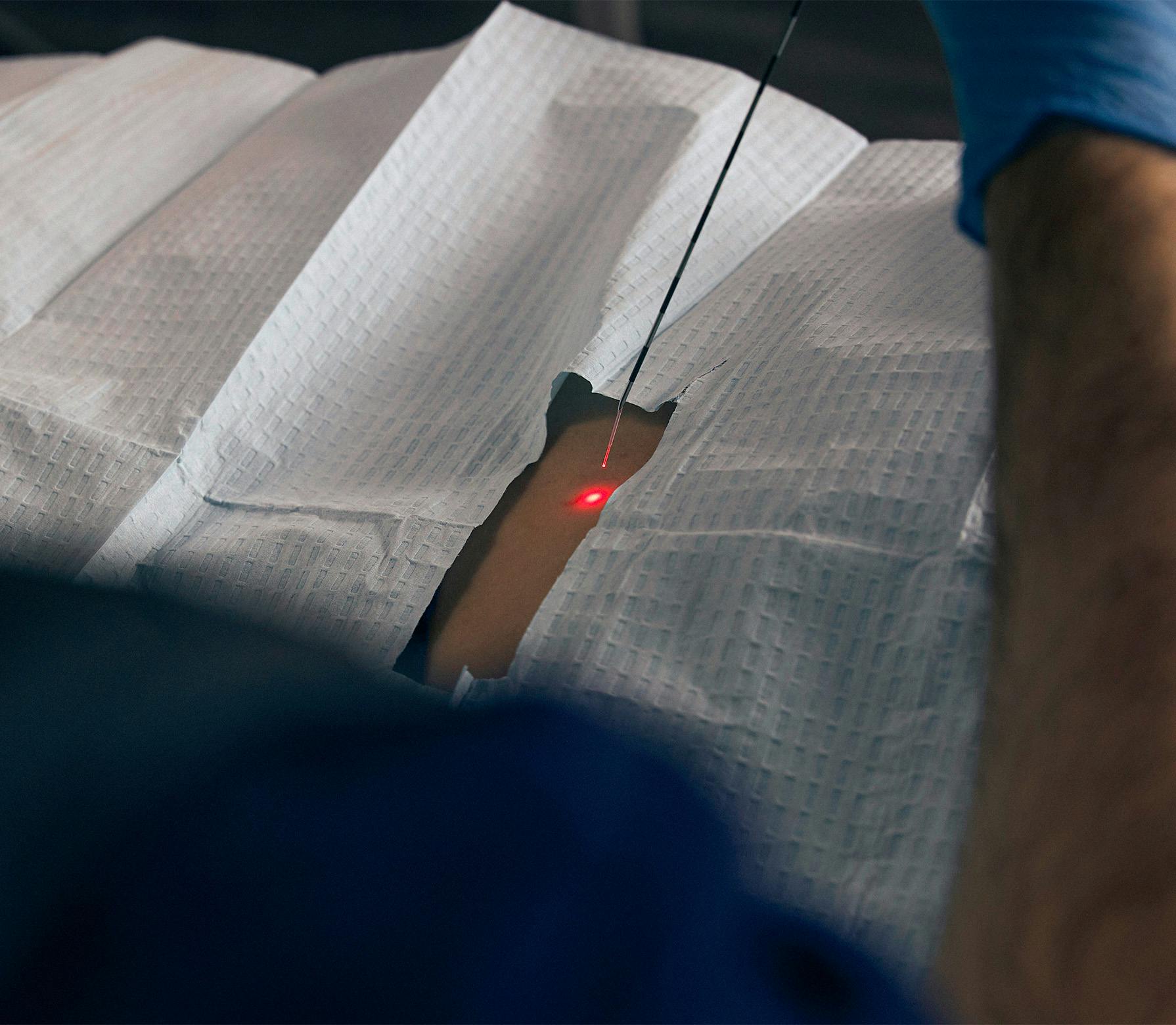 doctor injecting a patient
