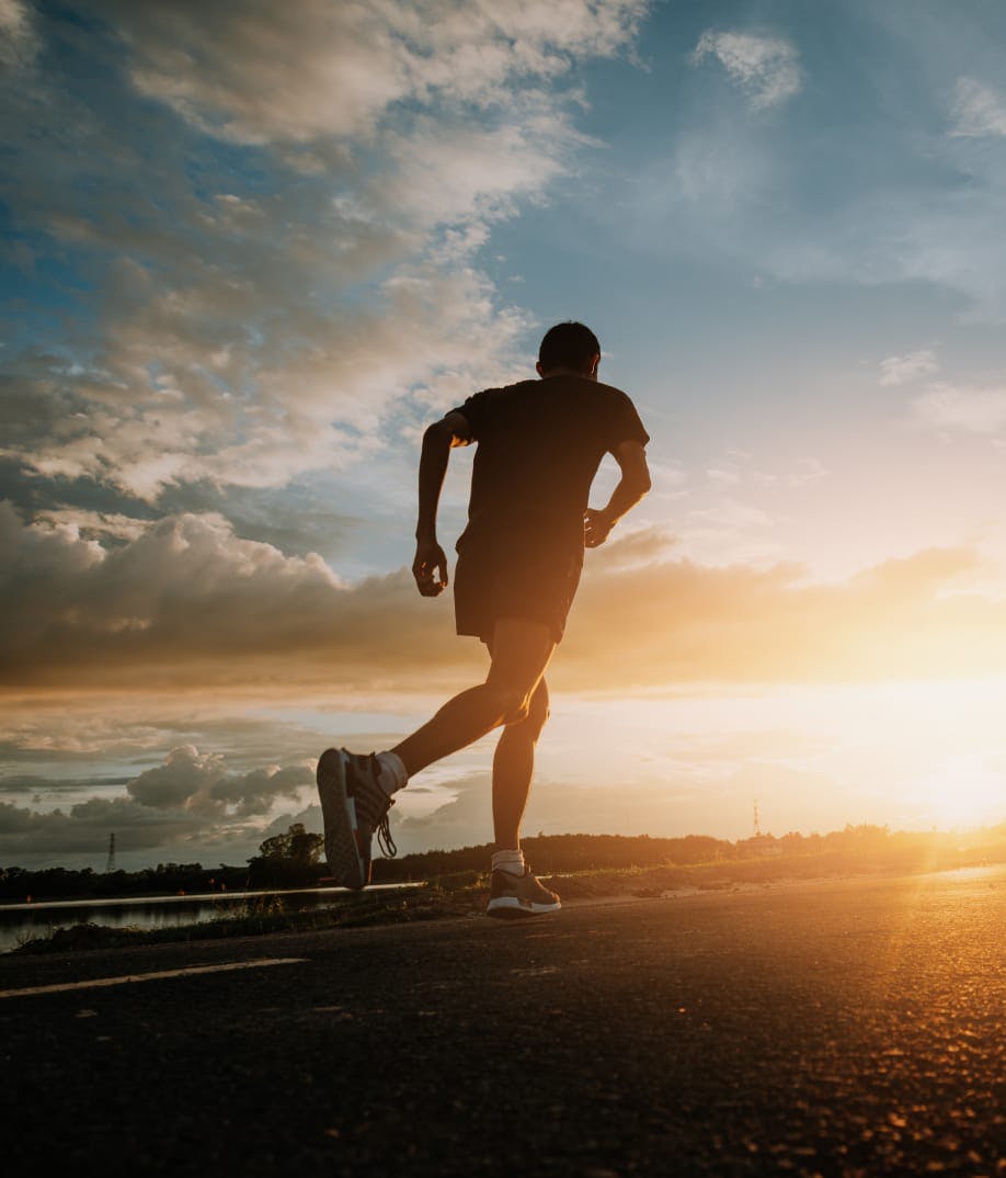 man running at sunset