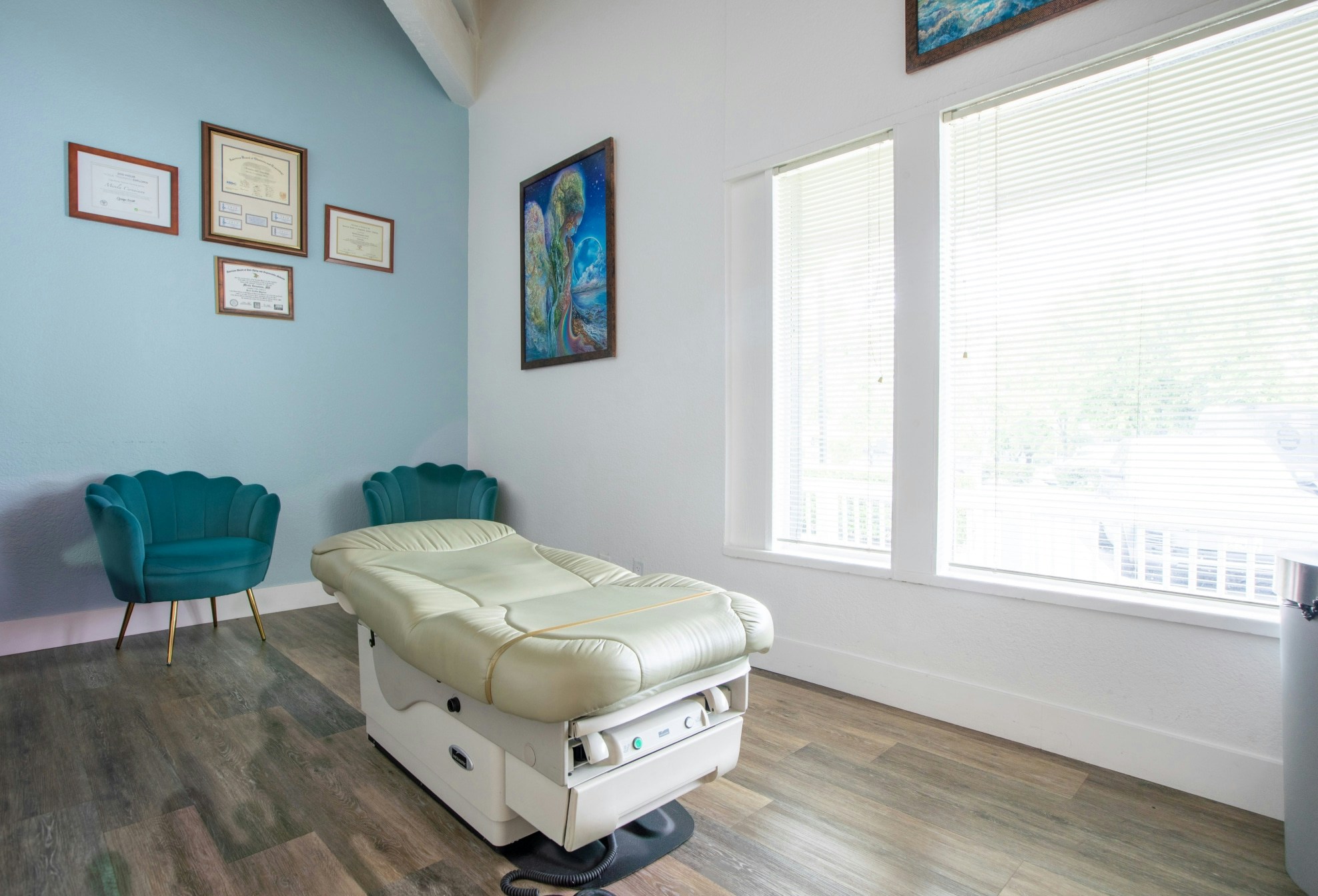 there is a room with a chair and a bed in it