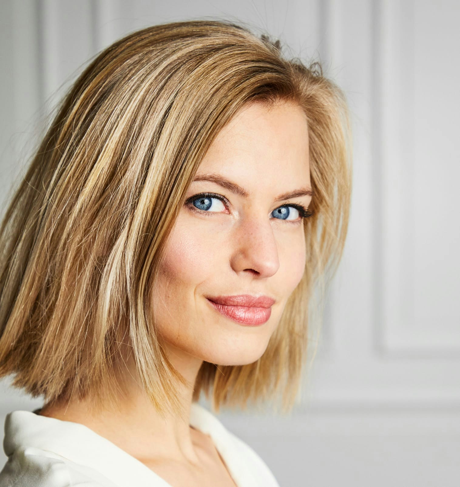 Woman with short blonde hair