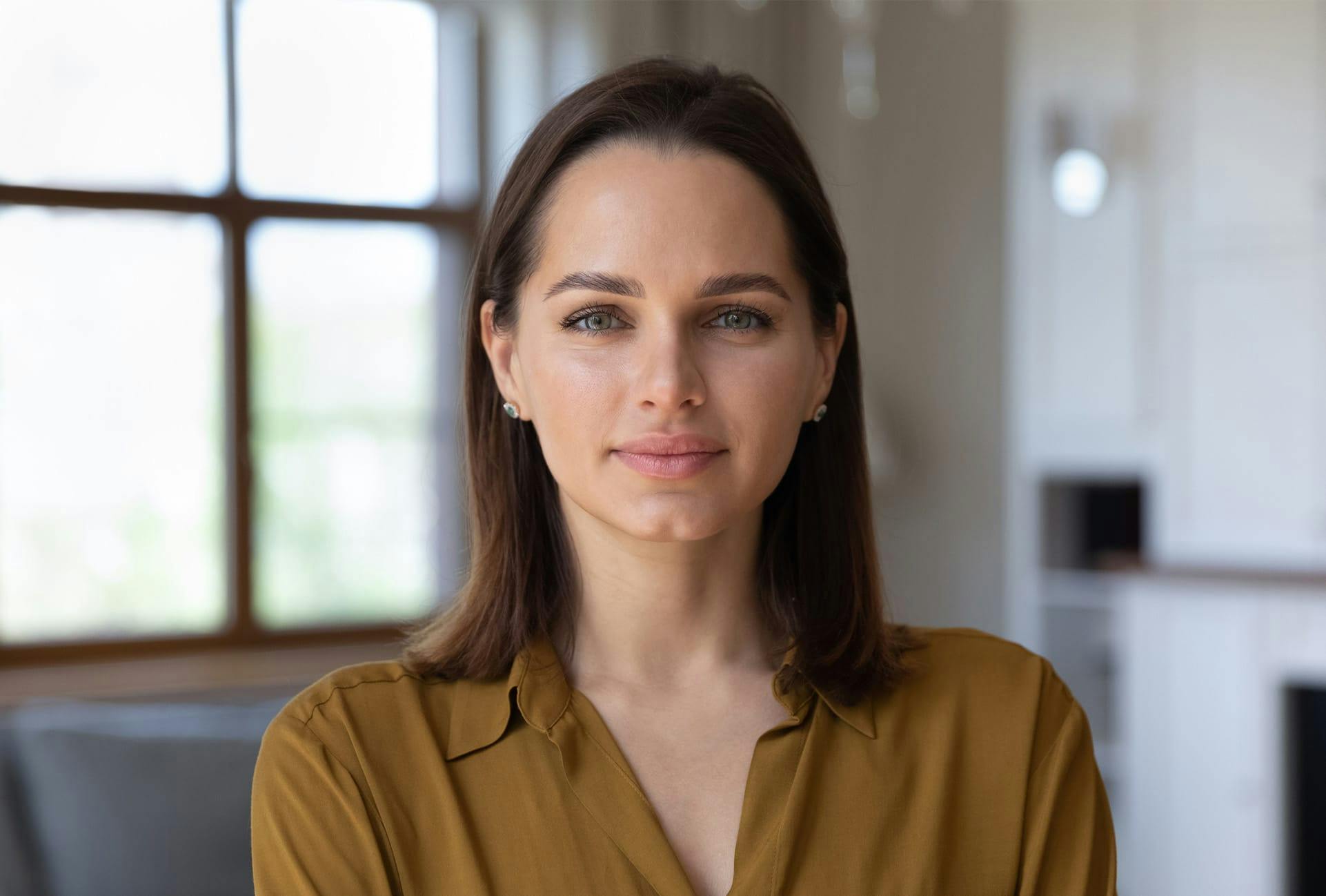Brunette woman wearing a blouse