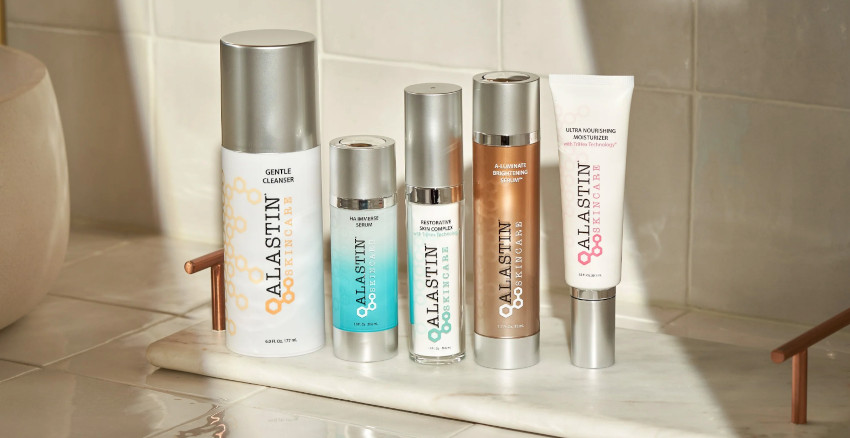 Alastin Skincare products lined up on counter
