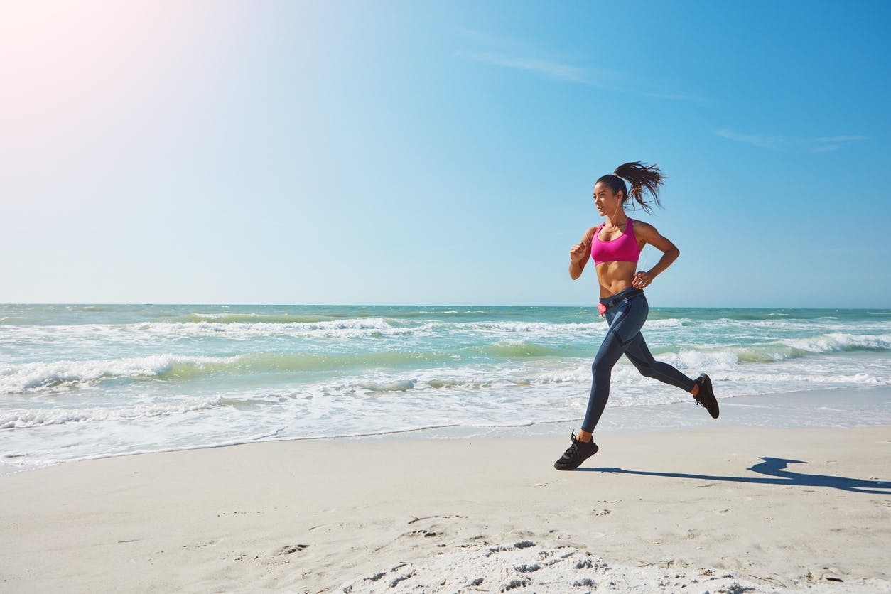 Woman running on beach