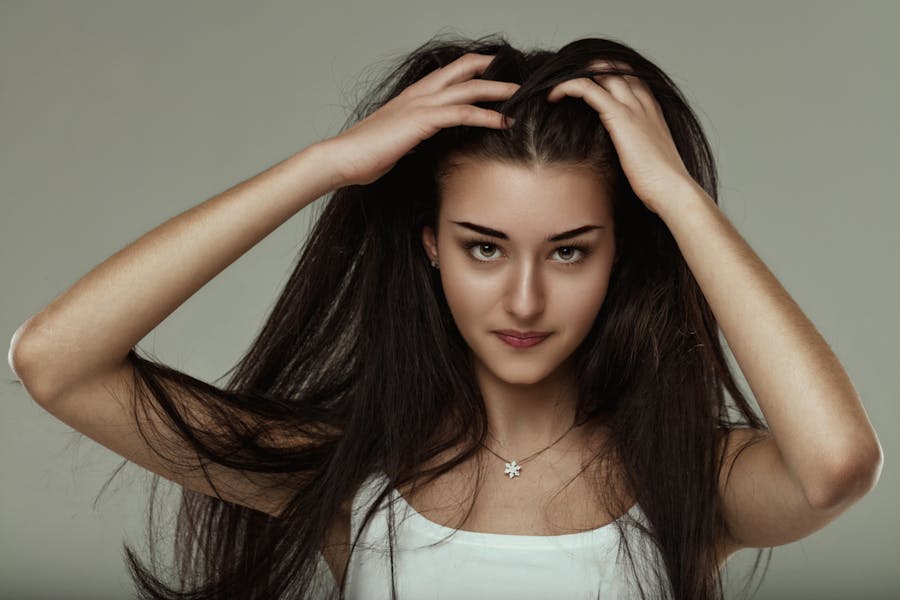 Beautiful Girl with thick Healthy hair after fotona hair treatement