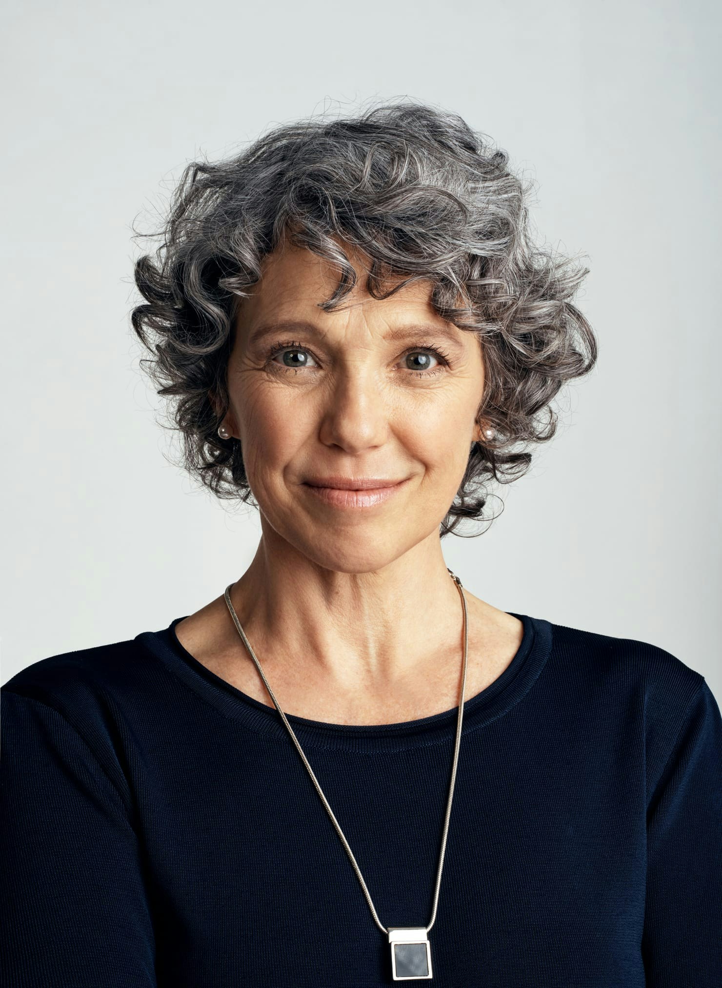 Woman with short curly hair