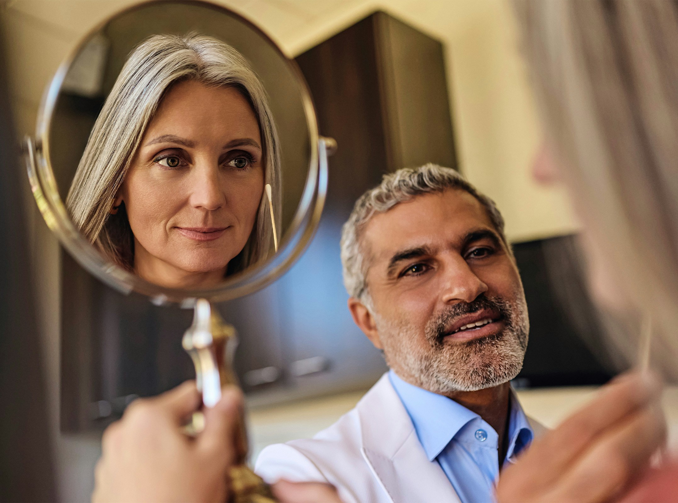 Dr.Karam doing a consultation