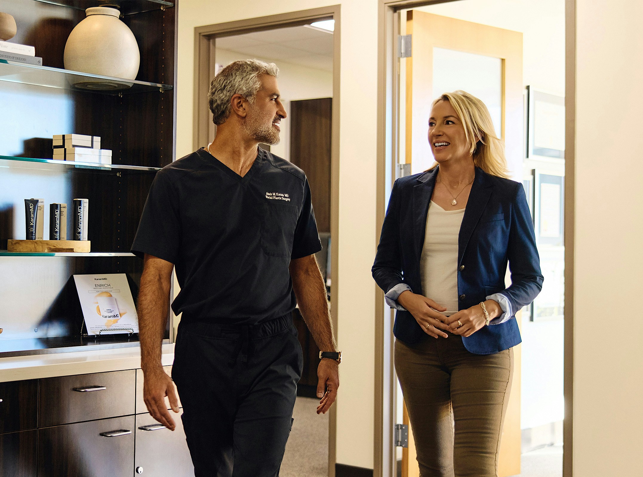 Dr. Karam talking to a patient
