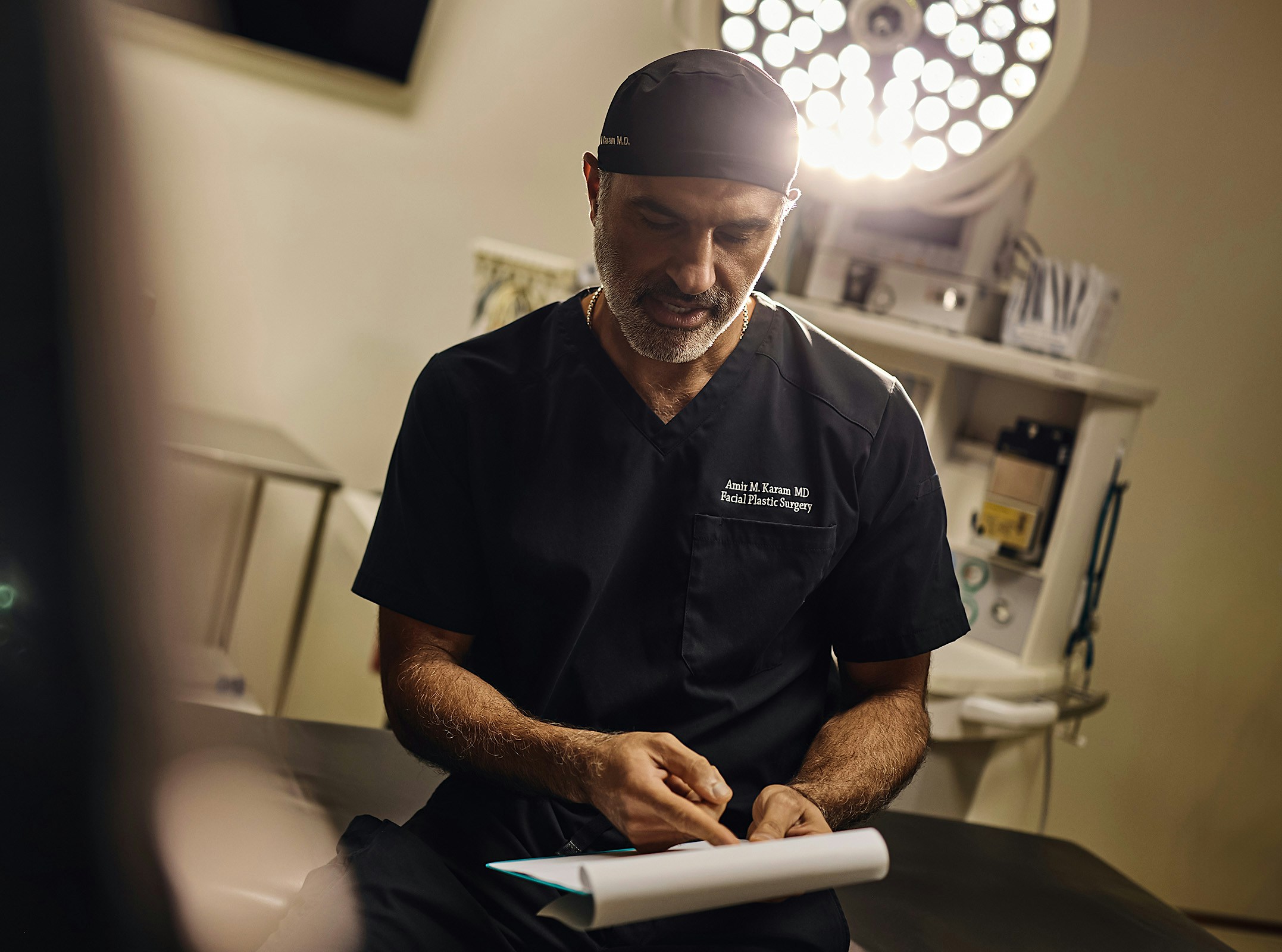 Dr.Karam explaining paperwork