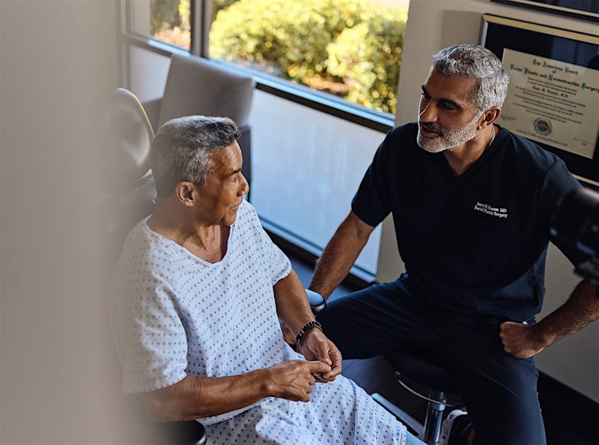 Dr.Karam talking to a patient