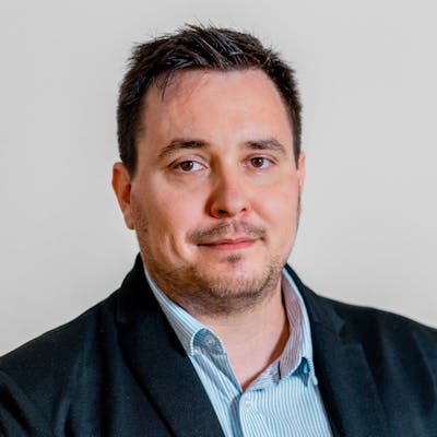 Professional portrait of Adam Larsen, a ServiceNow specialist.