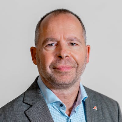 Professional portrait of Claus Hansen from ServiceNow partner Adeno.