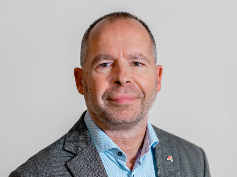 Professional portrait of Claus Hansen from ServiceNow partner Adeno.