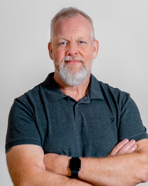 Portrait of Henrik Højager, a ServiceNow professional, posing with arms crossed.