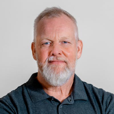 Portrait of Henrik Højager, a ServiceNow professional, posing with arms crossed.