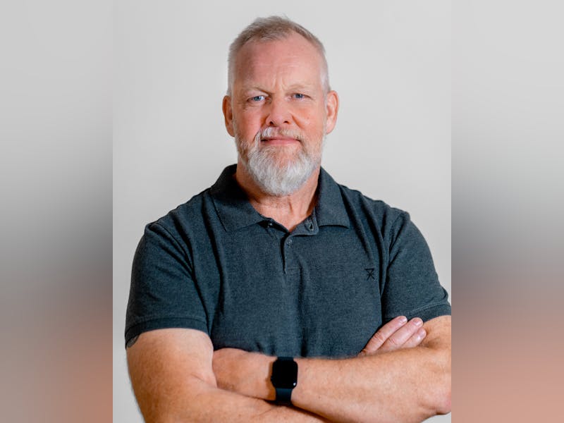 Portrait of Henrik Højager, a ServiceNow professional, posing with arms crossed.